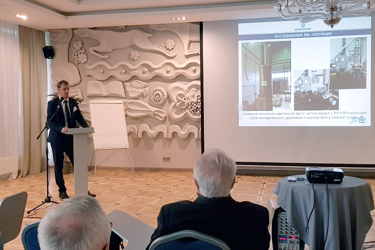 Pavel Kiryukhin is making a report at the meeting of the electrical engineering council of Rosenergoatom Concern