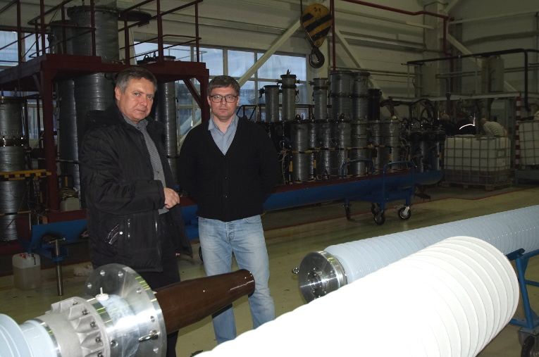 Yury Nikitin (L) and Artur Baklanov at the assembly shop of Izolyator plant