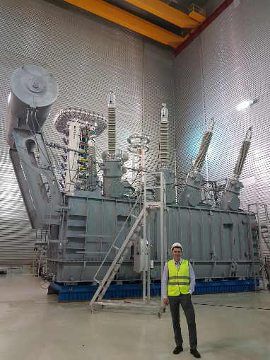 Maxim Zagrebin at Power Machines — Toshiba. High-voltage Transformers plants by the first Russian-made phase-shifting transformer. Izolyator 220 kV bushings are installed on the transformer