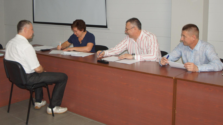 Elena Zubakova, Alexander Slavinsky and Sergey Moisseev are administering an exam on Russian Federation’s legislation as part of professional training activities at Izolyator