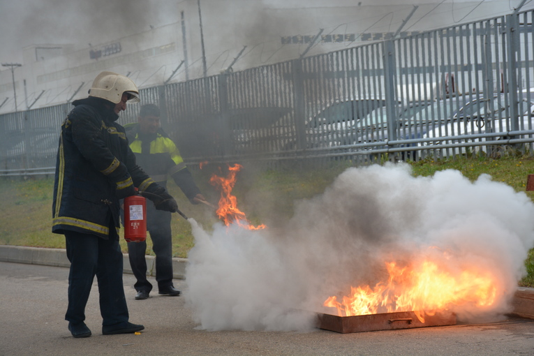 Evgeny Borzilo is practicing to use primary firefighting means