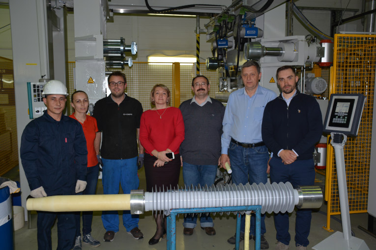 Participants of commissioning and start up of the new equipment for making of external polymer insulation of bushings
