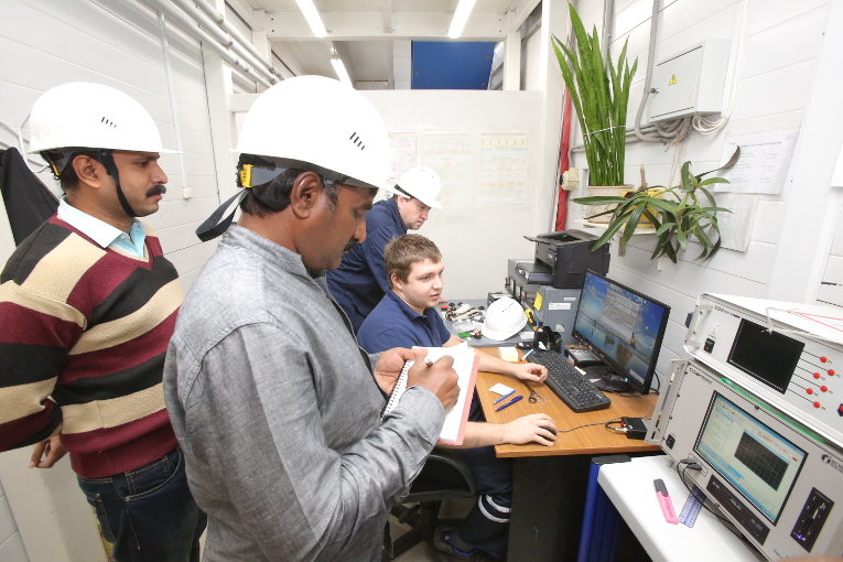 Test inspection of high-voltage bushings by Indian specialists at Izolyator plant