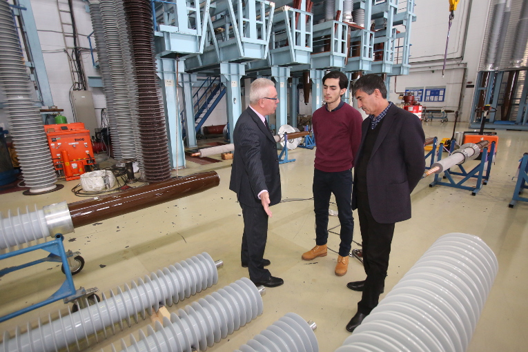 Victor Kiryukhin, Chahongir Boboev and Sodikzhon Boboev at the 220–1150 kV assembly shop at Izolyator plant