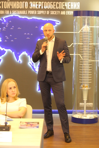 Alexander Savinov, Director of Strategic sales at Izolyator is making a report