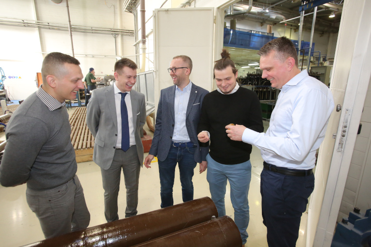 Representatives of Polish companies PSE S.A. and Eltel Networks during presentation of high-voltage bushings with internal RIP insulation production technology. 