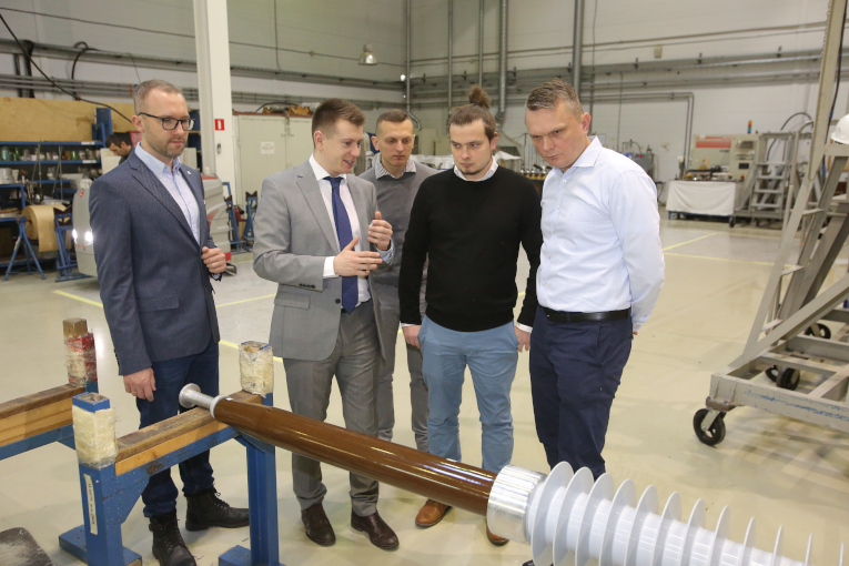 Representatives of Polish companies PSE S.A. and Eltel Networks at external polymer insulation for high-voltage bushings production facility