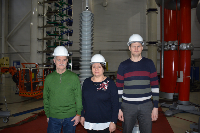 Participants of the Izolyator High-Voltage bushings Inspection, manufactured for the Leningrad NPP, L-R: Leonid Takhtarov, representative of Leningrad NPP, Tatyana Golkina, representative of VO Safety JSC, and Konstantin Ivanov, head of department at Favorstroy