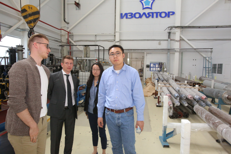 Representatives of the Chinese company Samgor Technology Ltd at the site of the assembly of high and ultra-high voltage bushings at Izolyator Company