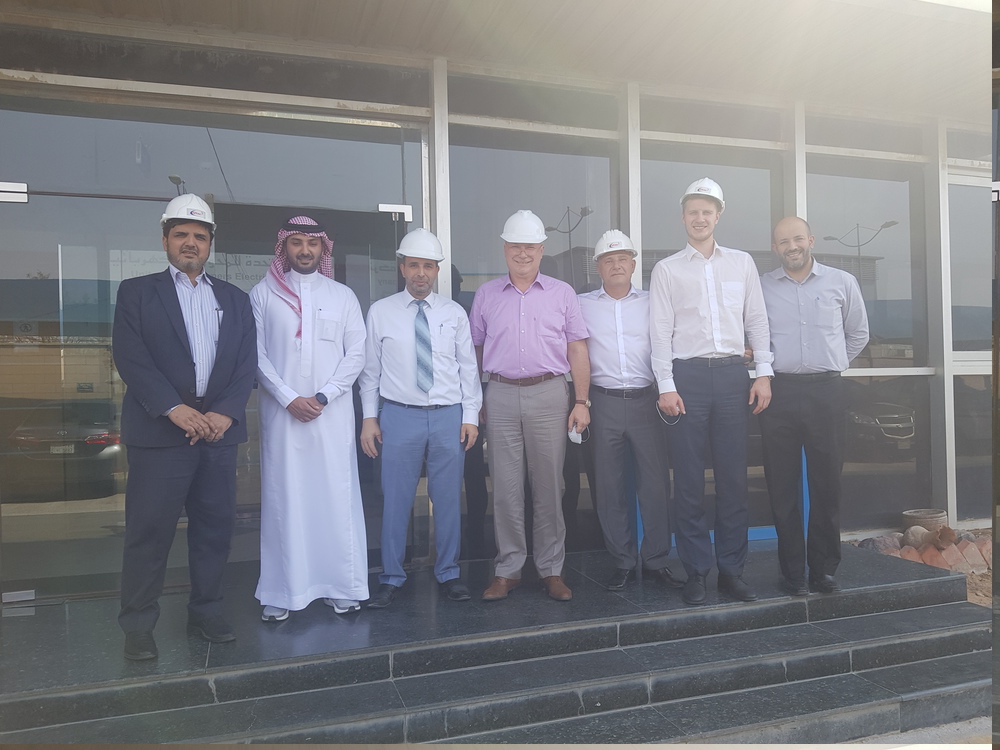 Participants of the talks at the United Transformers Electric Company’s transformer plant in Saudi Arabia