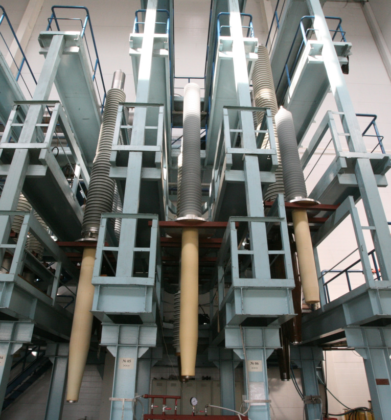 500, 330 and 220 kV RIN bushings placed on technological racks at the assembly shop of Izolyator Plant