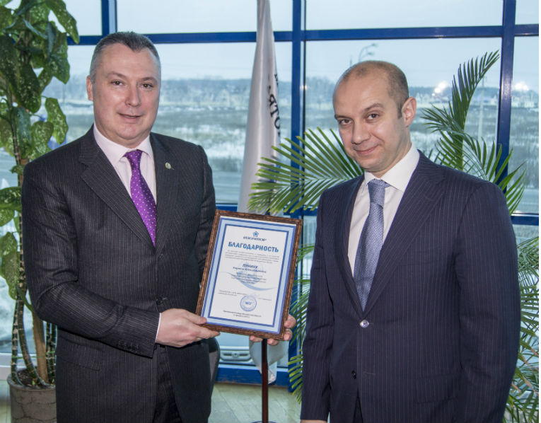 A.Z.Slavinsky presents K.A.Lunin with a letter of recognition