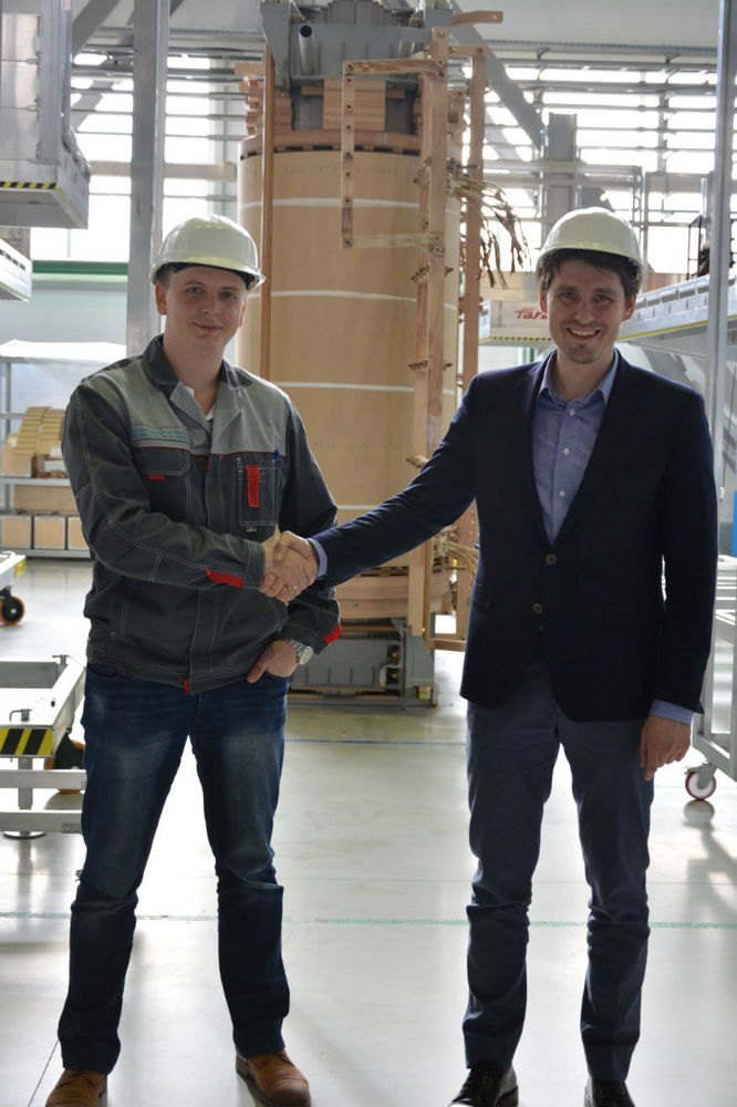 A. Smirnov (left) and M. Zagrebin at the Power Machines Toshiba High-Voltage Transformers LLC
