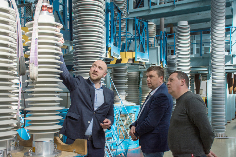 At the assembly shop of Izolyator, L-R: Alexander Savinov, Sergey Bychkov and Mikhail Tarasov
