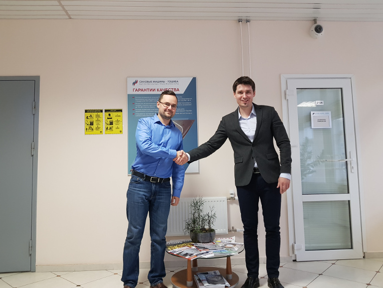 Mikhail Petrov (L) and Maxim Zagrebin at the meeting at Power Machines — Toshiba. High-voltage Transformers plant in November 2017