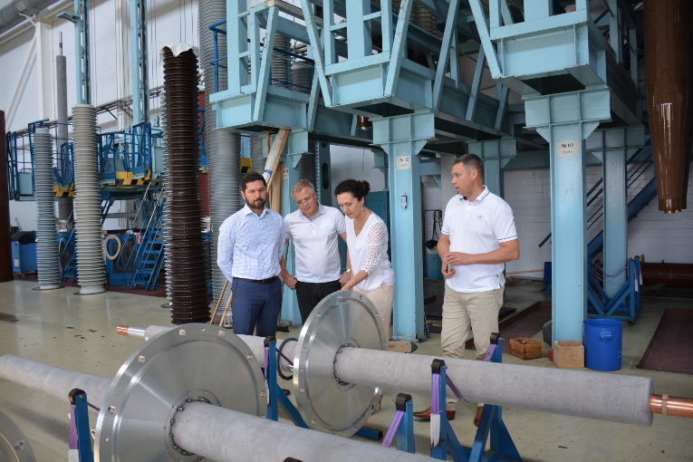 Alfa-Metal IS Ltd management at the assembly shop of Izolyator plant, L-R: General Director at Alfa-Metal IS Ltd Dmitry Trischenko, Director of Development at Alfa-Metal IS Ltd Dmitry Borunov, Commercial Director at Alfa-Metal IS Ltd Irina Borunova and Dmitry Abbakumov.
