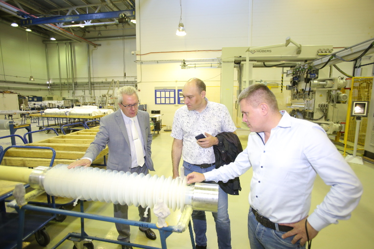 TGC -11 representatives are learning about the production technology of RIN bushings at Izolyator plant