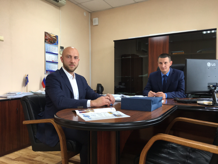 Alexander Savinov (L) and Evgeny Rybakov at talks at TGC-14