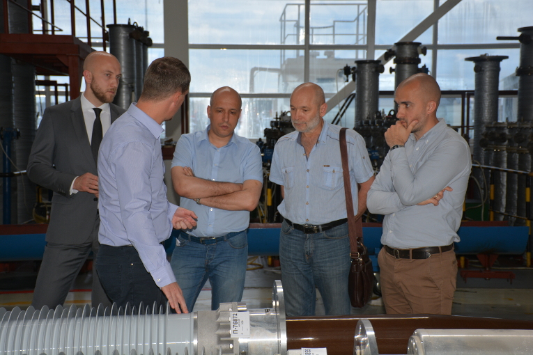 Representatives of Enel Russia at the assembly shop of Izolyator plant