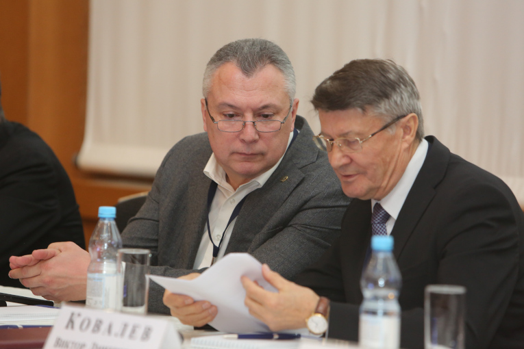 Alexander Slavinsky (L) and President of International TRAVEK Association Victor Kovalev at the panel of the XXVIII Conference
