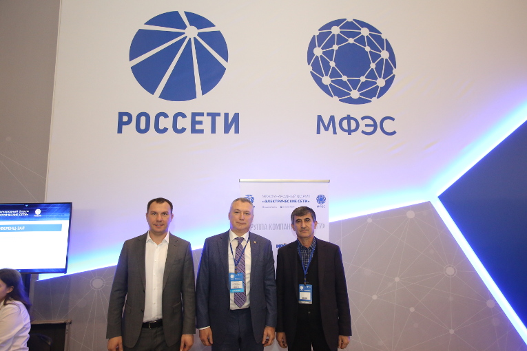 Maxim Osipov, Alexander Slavinsky and Sodikzhon Boboev at the International Forum Power Grids