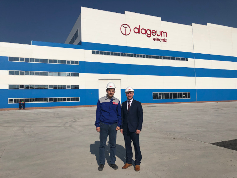 Dmitry Karasev and Adilbek Tazhibaev, Power Transformers Chief Designer of Asia Trafo, at the production facility of Asia Trafo Plant in Kazakhstan