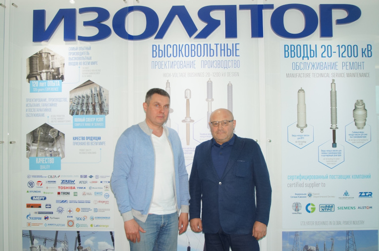 Dmitry Abbakumov (left) and Sergey Kalashnikov, Head of Electrical Porcelain Department at Global Insulator Group, during negotiations at Izolyator