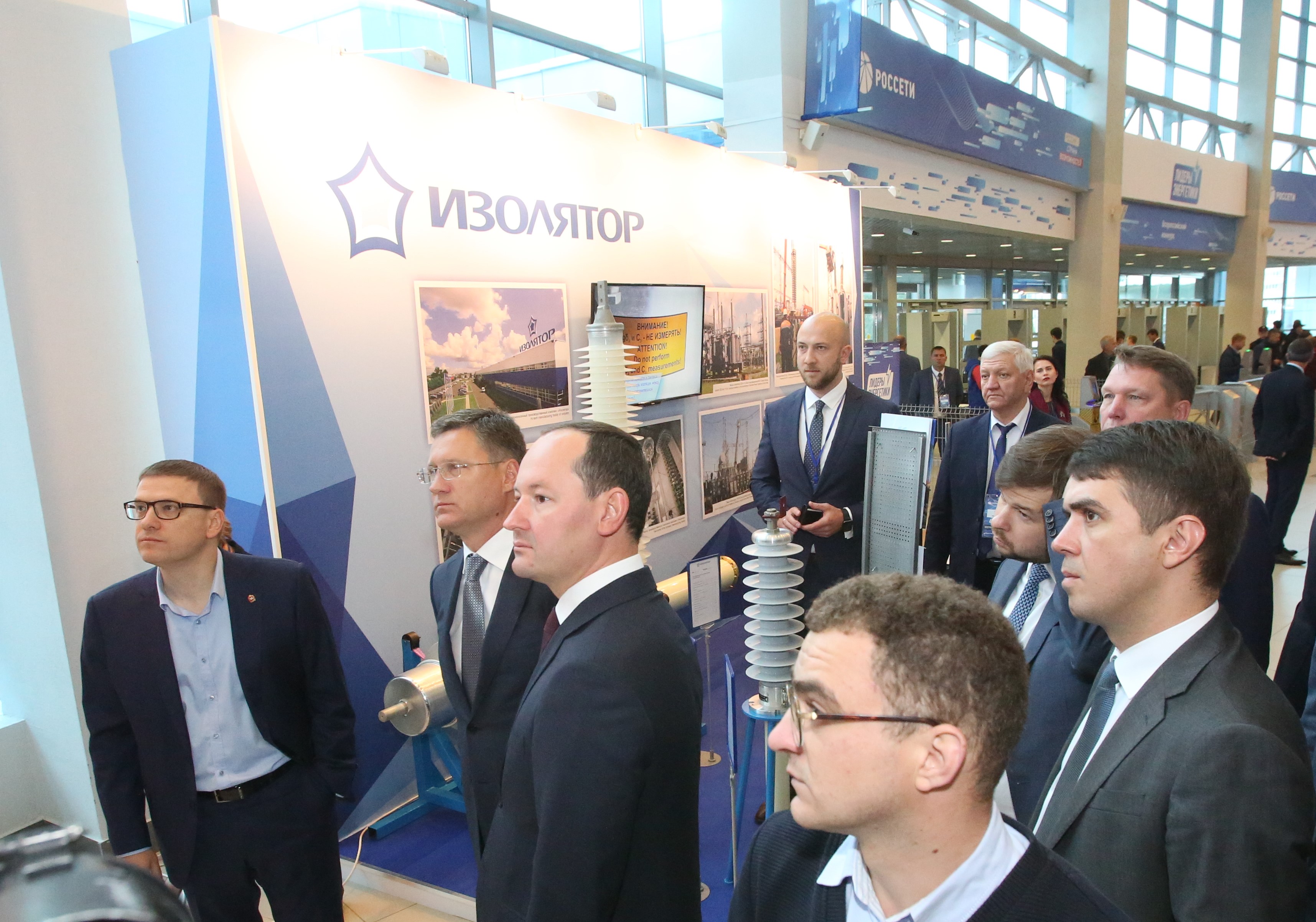 Walking the exposition of partner companies of Rosseti Group at the All-Russian congress “Leader of Power Industry” in Chelyabinsk, L-R: Acting Governor of Chelyabinsk region Alexey Teksler, Minster of Energy of Russian Federation Alexander Novak, General Director of Rosseti Group Pavel Livinsky