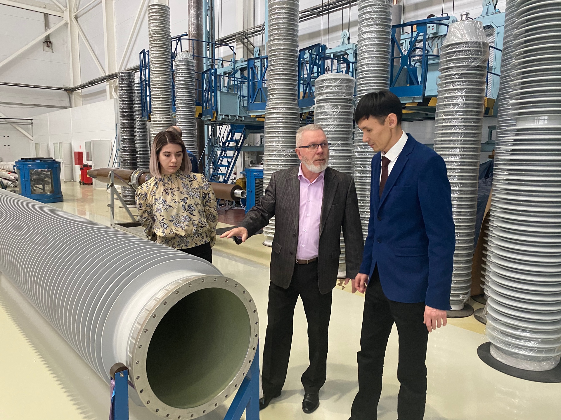 Director of Ishim Techelectro Eldar Sarman is getting familiar with production of HV bushings at Izolyator