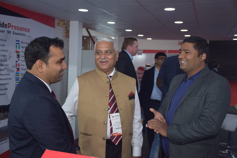 Deputy Chairman of Board Dr. Ashok Singh at Massa Izolyator Mehru Pvt. Ltd. (at the forefront C) is receiving visitors at the exhibition stand